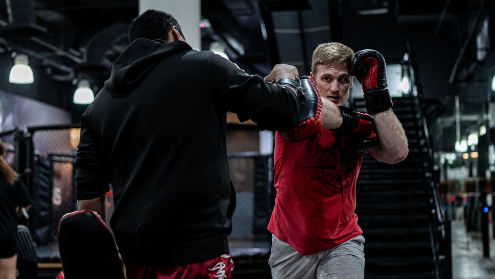 Holding Muay Thai Mits: A Coachs Guide,tips for better training.